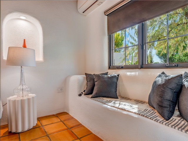 tiled bedroom with an AC wall unit