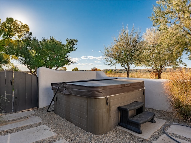 view of terrace featuring a hot tub