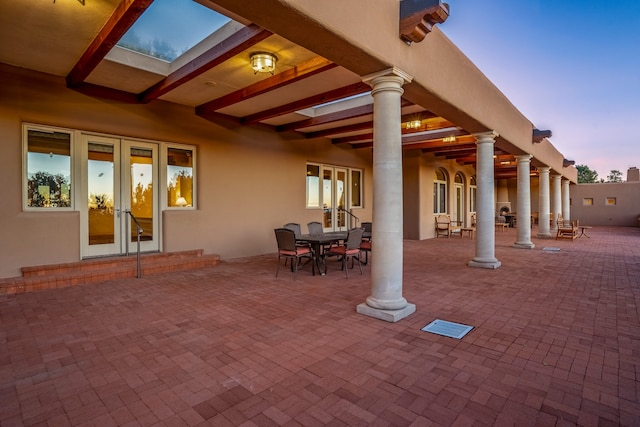 patio terrace at dusk with french doors