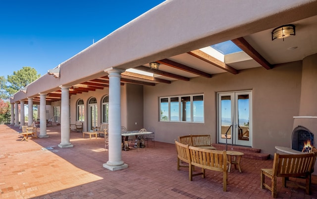 view of patio featuring french doors