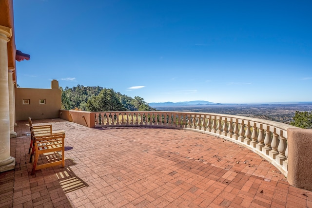 view of terrace featuring a mountain view