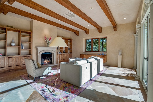 tiled living room with beam ceiling