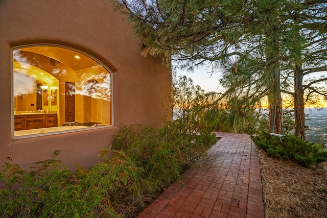 view of property exterior at dusk