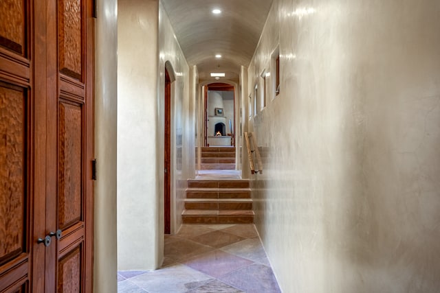 corridor featuring light tile floors