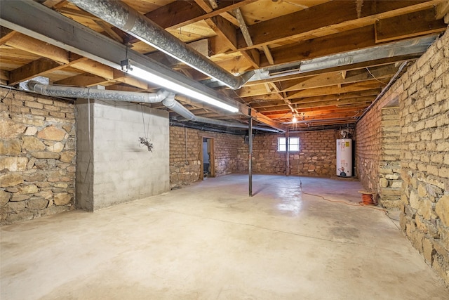 basement featuring water heater