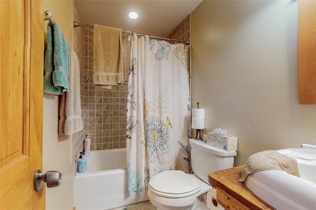 full bathroom featuring vanity, toilet, and shower / bath combo with shower curtain