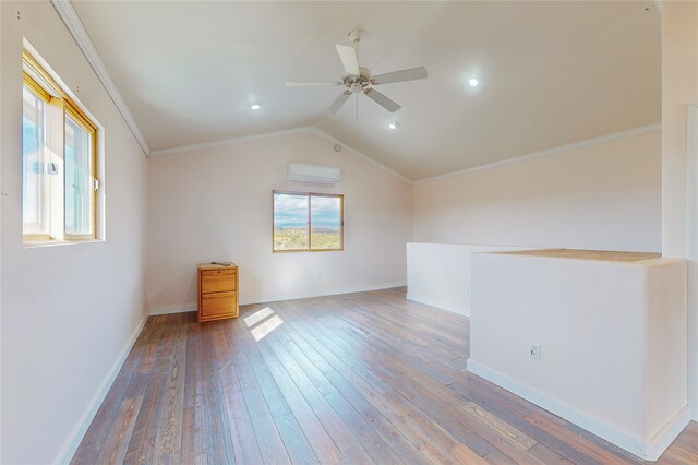 spare room featuring hardwood / wood-style flooring and crown molding