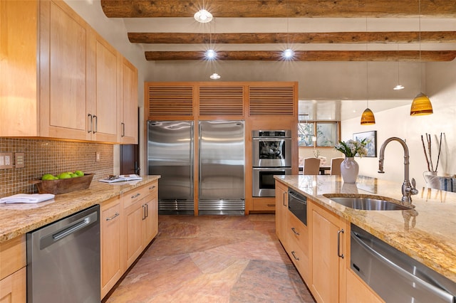 kitchen featuring beam ceiling, tasteful backsplash, stainless steel appliances, light stone countertops, and sink