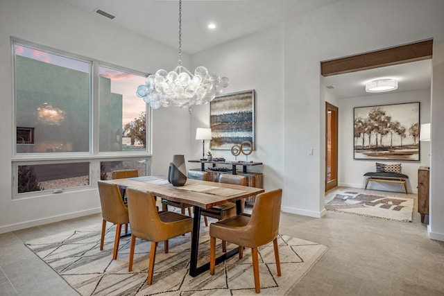 dining room with a chandelier