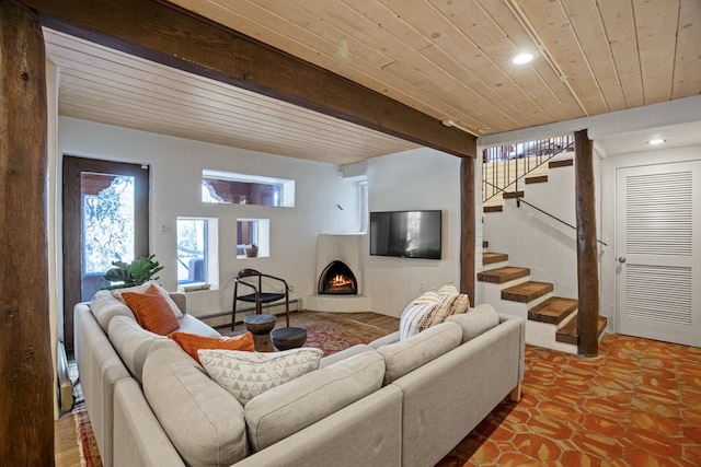 living room with baseboard heating and beam ceiling