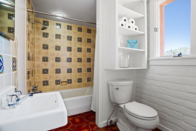 full bathroom featuring shower / bath combo, toilet, sink, and tile flooring