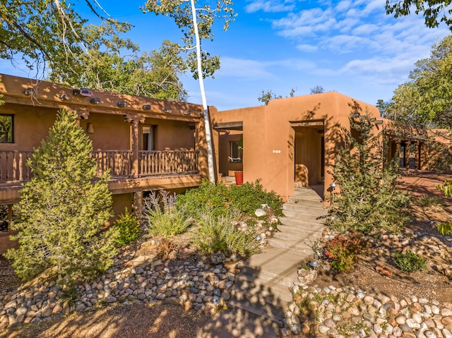 view of adobe home