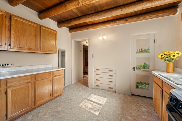 kitchen featuring light tile floors, range, beam ceiling, and wooden ceiling