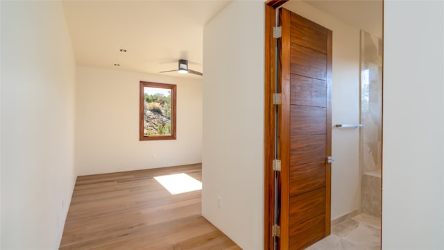 hallway with light tile floors