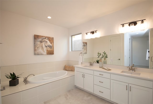 bathroom with double sink vanity, a relaxing tiled bath, and tile flooring