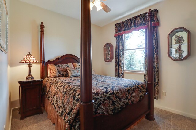 carpeted living room featuring wood ceiling, ceiling fan, and beamed ceiling