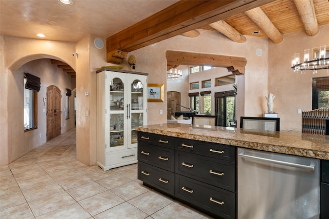 kitchen featuring wood ceiling, an inviting chandelier, light tile patterned floors, dishwasher, and beamed ceiling