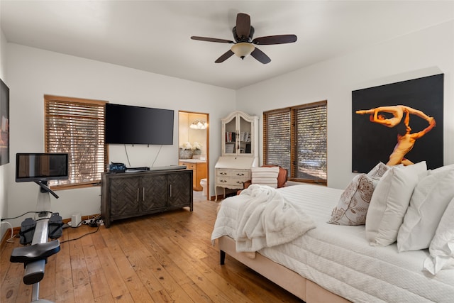 bedroom with hardwood / wood-style flooring and ceiling fan