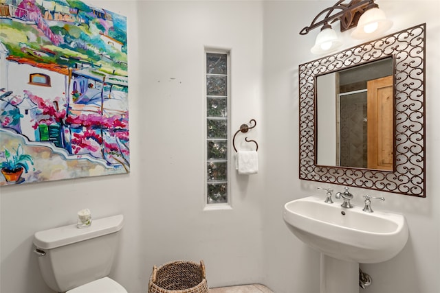 bathroom with sink and toilet