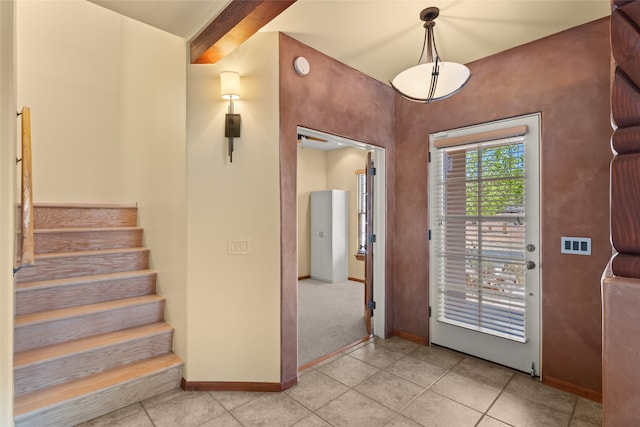 view of tiled foyer entrance