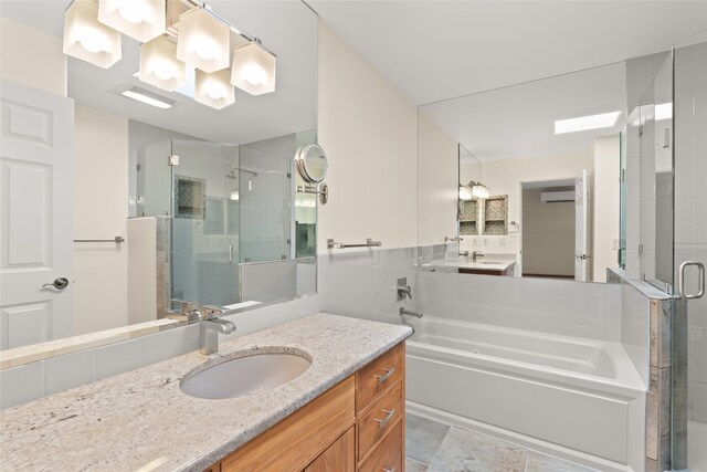 bathroom featuring vanity, plus walk in shower, a wall mounted air conditioner, and tile walls