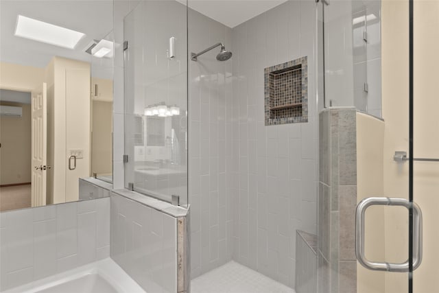 bathroom with a wall mounted air conditioner and a shower with door