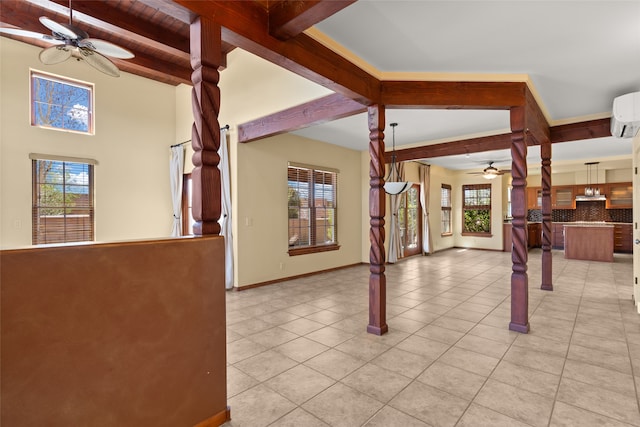 unfurnished living room featuring ceiling fan, beamed ceiling, and light tile patterned floors