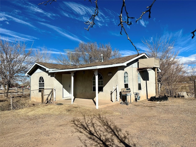 view of front of house featuring a patio