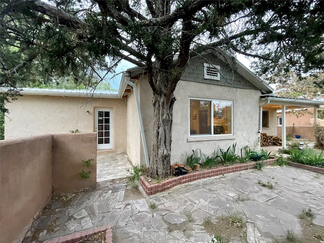 rear view of house with a patio area