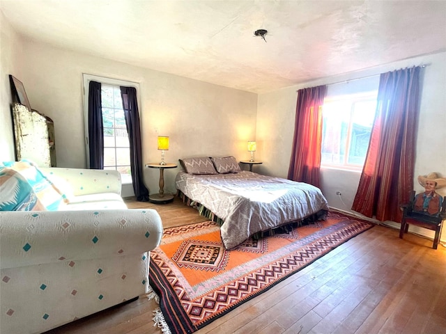 bedroom featuring hardwood / wood-style floors