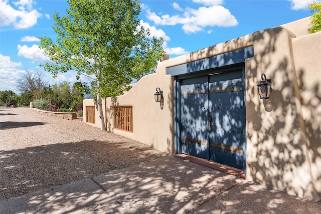 view of side of property featuring a garage