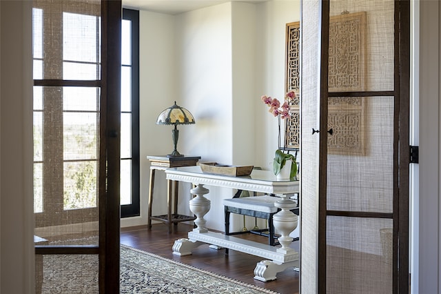 doorway to outside featuring hardwood / wood-style flooring