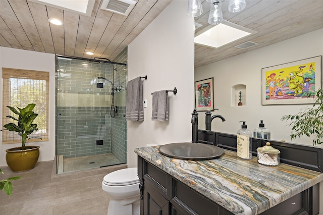 bathroom with toilet, wood ceiling, and walk in shower