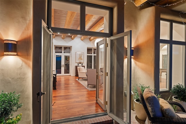 entrance to property featuring french doors