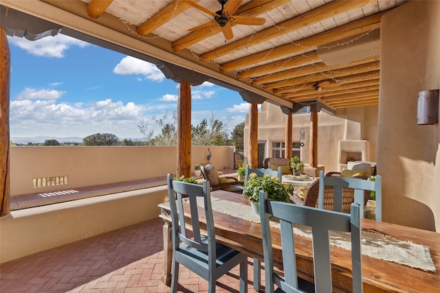 view of patio / terrace featuring ceiling fan