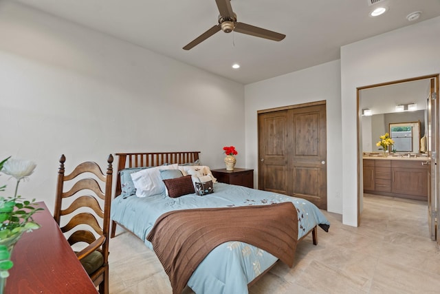 bedroom with recessed lighting, connected bathroom, a closet, and a ceiling fan