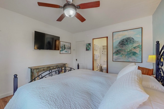 bedroom featuring wood-type flooring, connected bathroom, and ceiling fan