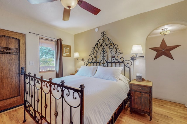 bedroom featuring ceiling fan and light hardwood / wood-style flooring