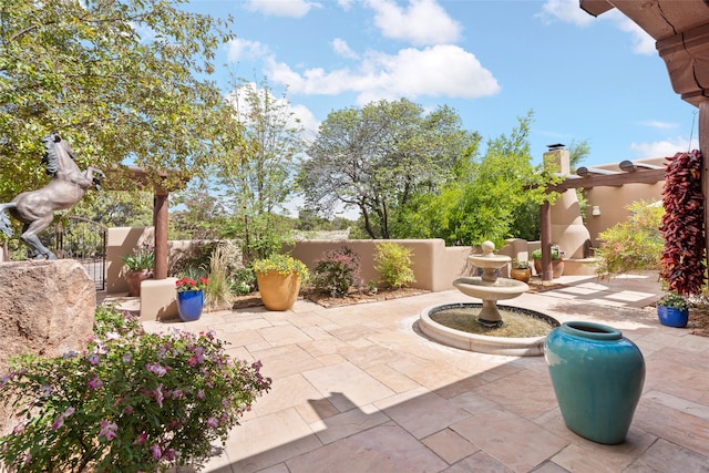 view of patio with fence