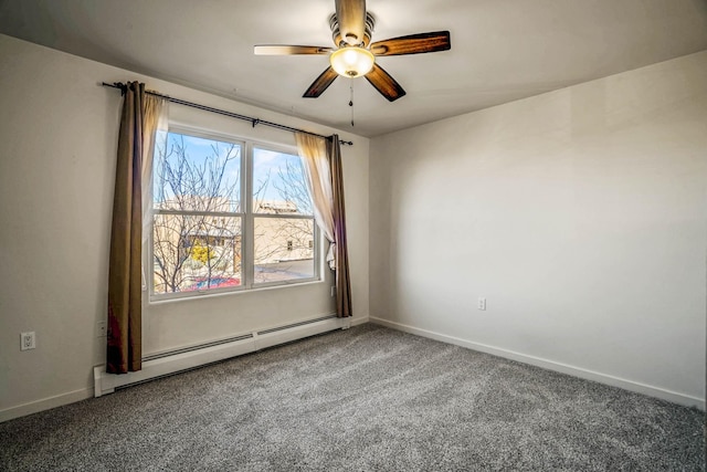 spare room with a ceiling fan, a baseboard heating unit, baseboards, and carpet floors