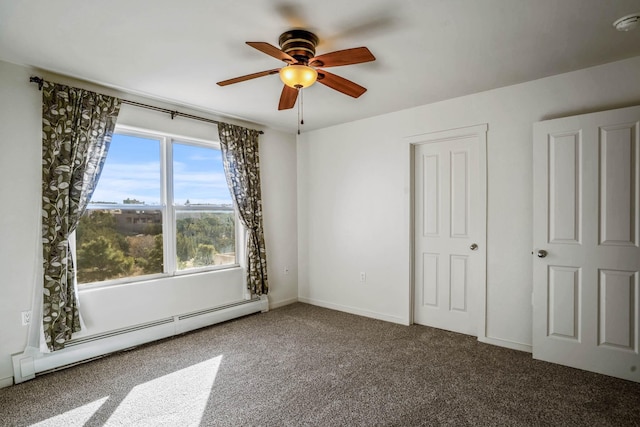 unfurnished bedroom featuring ceiling fan, baseboards, carpet, and a baseboard radiator