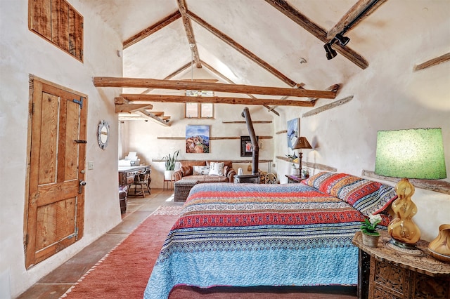 bedroom with beamed ceiling, high vaulted ceiling, and tile patterned floors