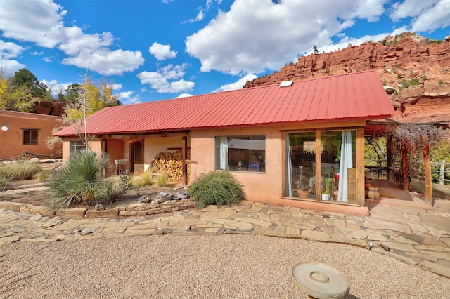 view of front of property with a patio