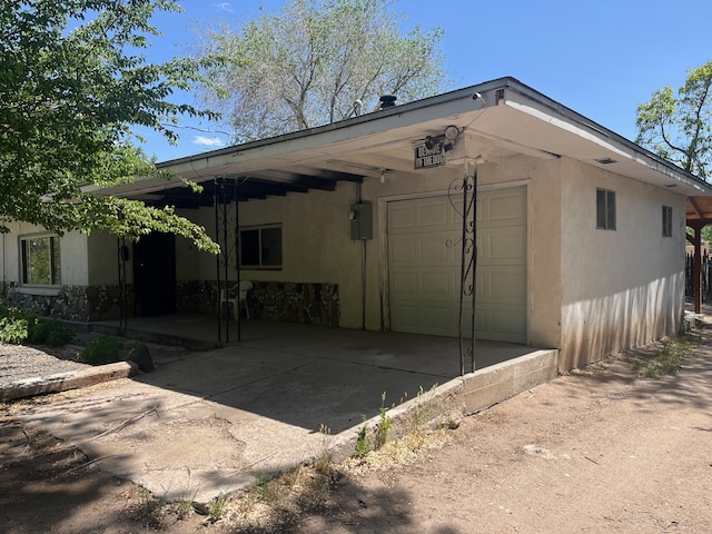 view of property exterior with a garage