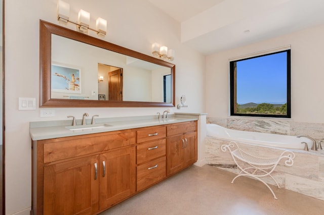 bathroom with a relaxing tiled tub and vanity