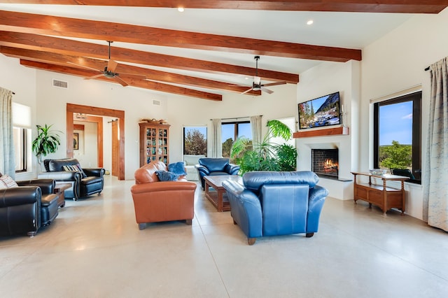 living room featuring lofted ceiling with beams and ceiling fan