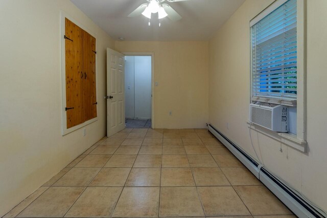 bathroom with tile patterned floors and an enclosed shower