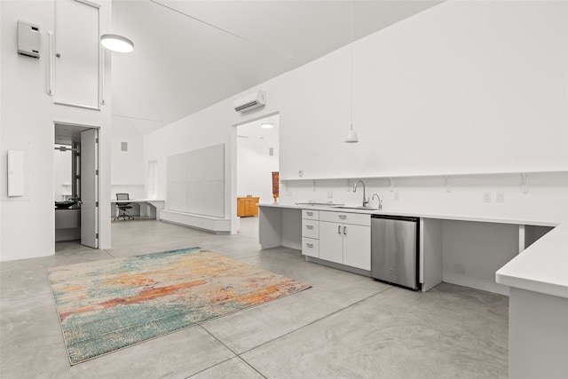 kitchen featuring white cabinetry, sink, fridge, and a high ceiling