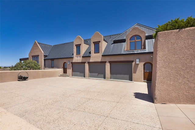 view of front of home featuring a garage