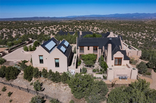 drone / aerial view with a mountain view